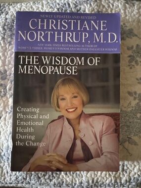 The Wisdom of Menopause / Christiane Northrup MD. Purple & Pink Cover soft cover